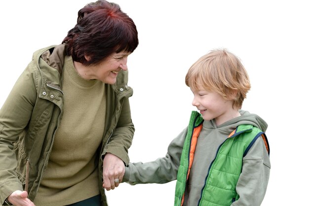 little boy spending time outdoors with his grandmother