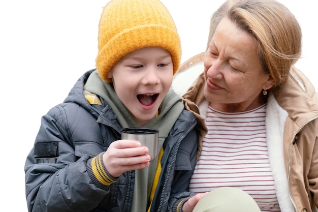 Free PSD little boy spending time outdoors with his grandmother