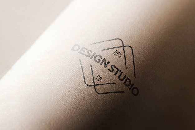 Logo mockup in curved paper