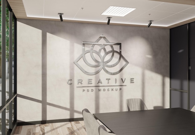 Логотип на стене офиса с 3d эффектом металла mockup