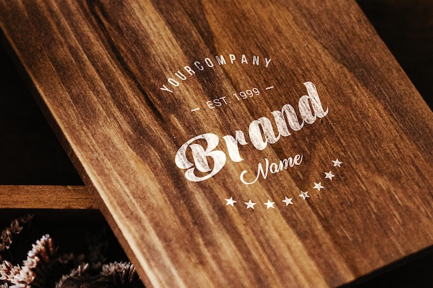 Logo on wooden table mock up