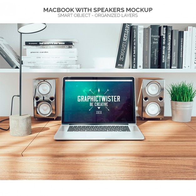 PSD gratuito macbook con altoparlanti mock up