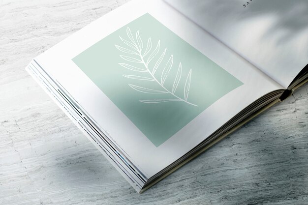 Magazine mockup with a leaf