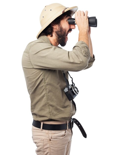 Man looking through binoculars