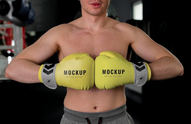 Man wearing boxing gloves mock-up