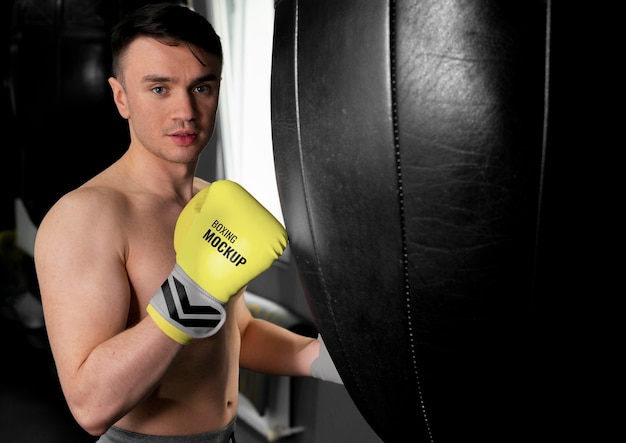 Man wearing boxing gloves mock-up
