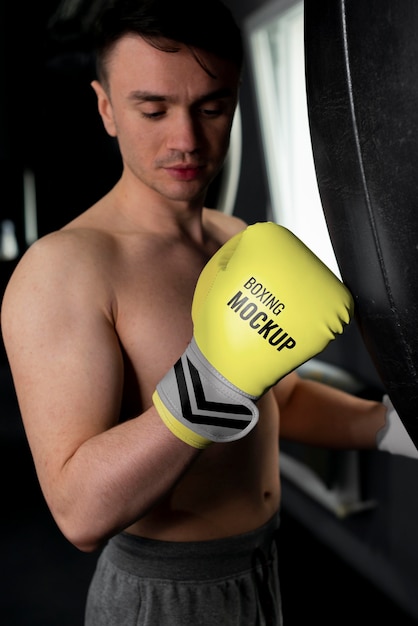 Man wearing boxing gloves mock-up