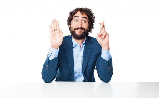 Man with crossed fingers