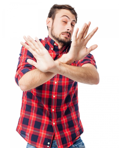 Man with hands in front of body