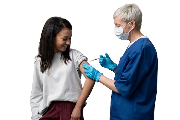 Medic administering vaccine