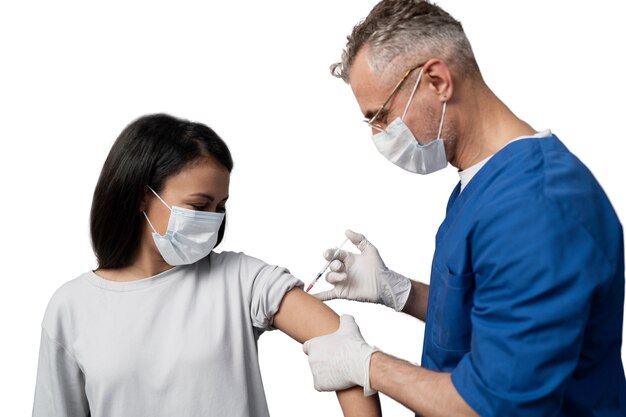 Medic administering vaccine