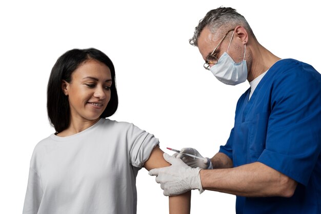 medic administering vaccine