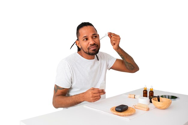 medium shot man with selfcare products