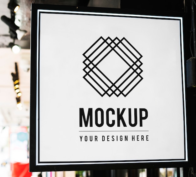 Free PSD minimal shop sign mockup with geometric design