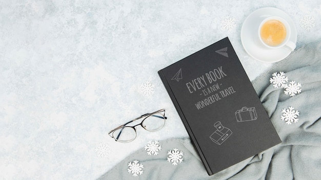 Minimalist book concept with glasses and cup of coffee