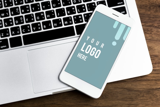 Mobile Phone on Laptop Mockup – Free PSD Download