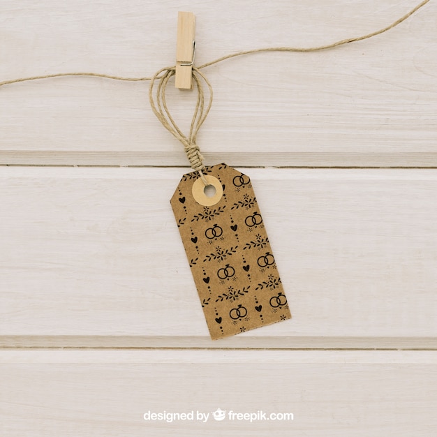 Free PSD mock up with label hanging on a cord