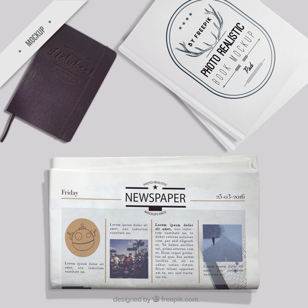 Free PSD mockup of newspaper with notebook and photo book