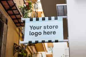 Free PSD mockup sign outside shop