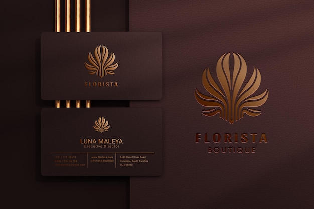 Modern logo mockup with embossed and debossed effect on dark business card Premium Psd