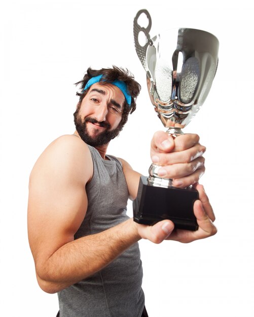 Muscular man with a trophy