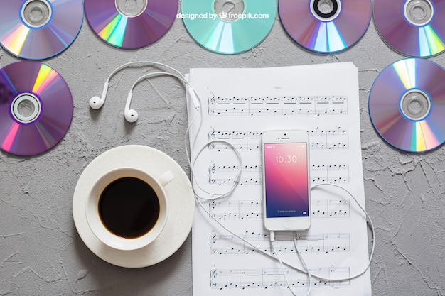 Free PSD music mockup smartphone on notes