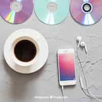 Free PSD music mockup with coffee and smartphone