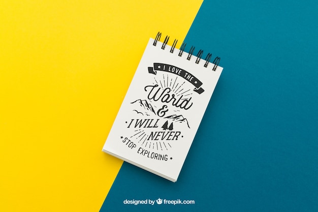 Free PSD notepad with quote on yellow and blue background