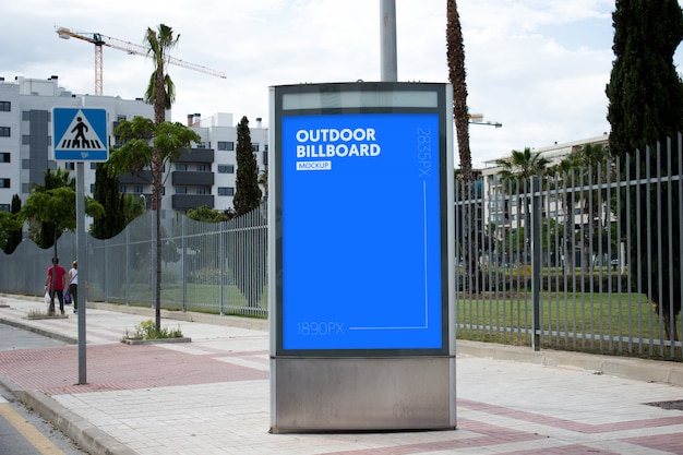 outdoor billboard next to park