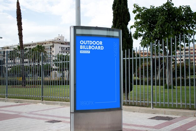 outdoor billboard next to park