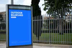 Free PSD outdoor billboard next to park