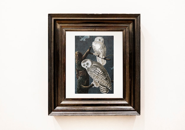 Free PSD painting of owls in a wooden frame