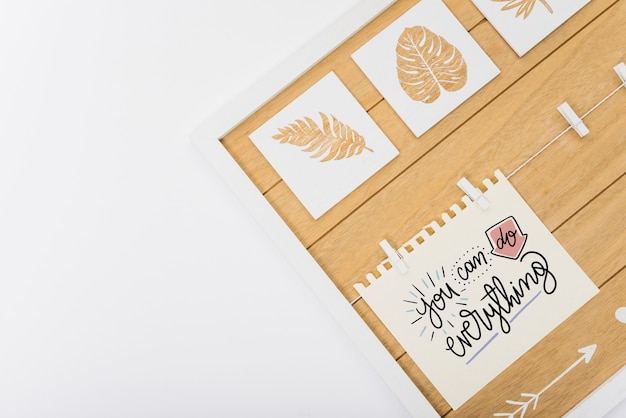 Paper mockup with tropical leaves