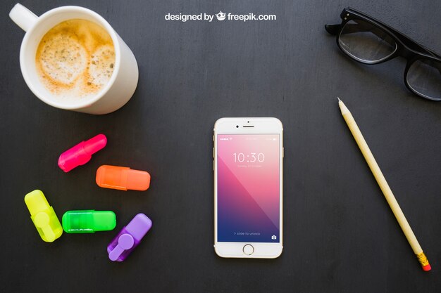 Phone, markers, pencil, glasses and coffee