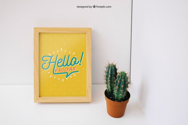 Photo frame mockup with cactus