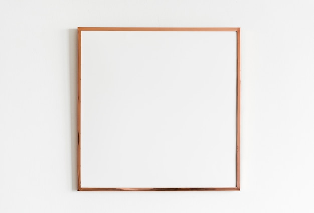 White blank canvas mockup square size on wood wall for arts painting and  photo hanging interior decoration Stock Photo