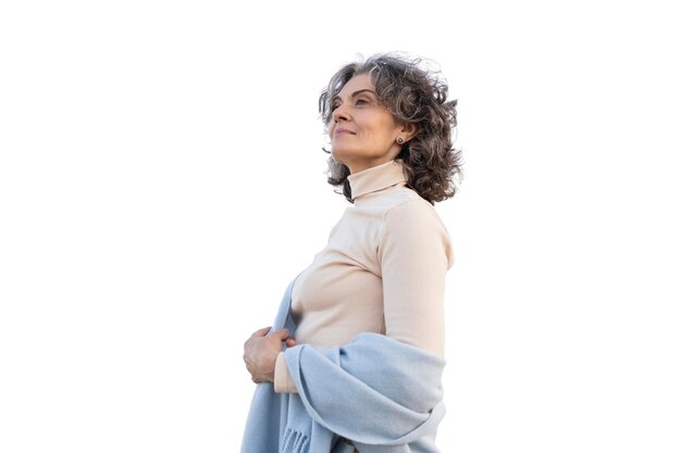 portrait of adult woman spending time outdoors by herself