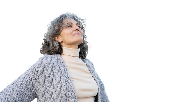 portrait of adult woman spending time outdoors by herself