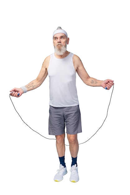 Portrait of senior man with jumping rope