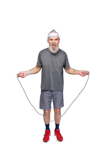 Free PSD portrait of senior man with jumping rope