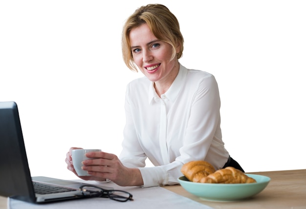 Portrait of woman using laptop computer