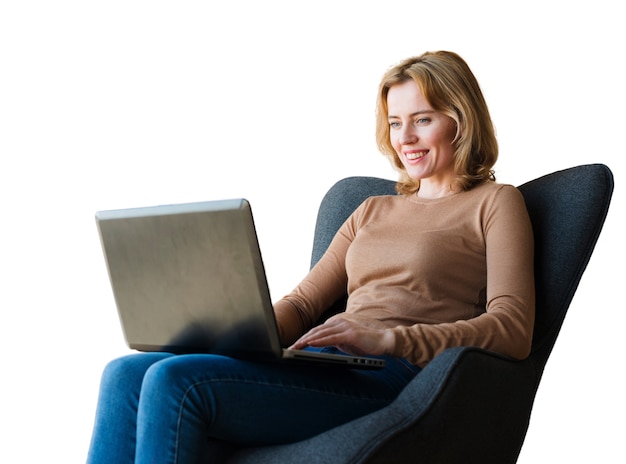 Free PSD portrait of woman using laptop computer