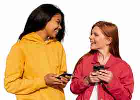 Free PSD portrait of young teenage girls with smartphone