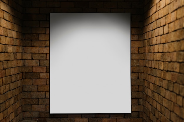 Free PSD projector mockup against a brick wall