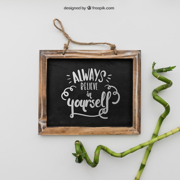 Free PSD: Quote on Chalkboard with Bamboo