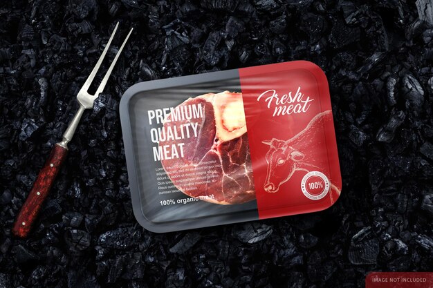 Download Premium Psd Raw Meat Steak Packaging Mockup Over Grill Coal