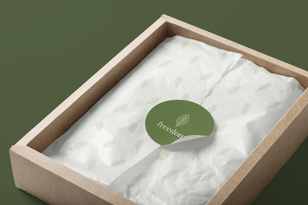 Realistic paper sticker mockup template on a box