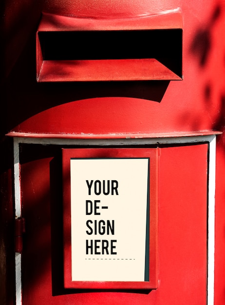 Red postbox with a white sign mockup