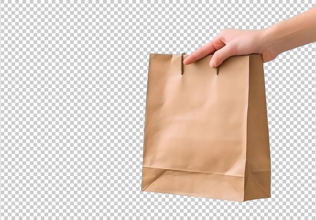 Free PSD right hand holding paper bag with clipping path isolated on background