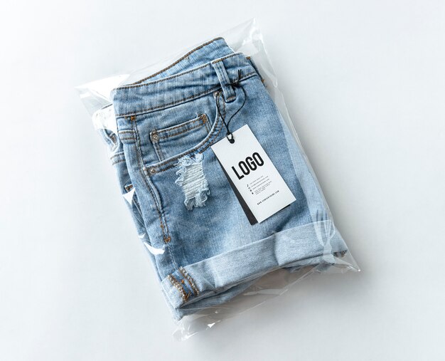 Ripped jean shorts with a tag mockup
